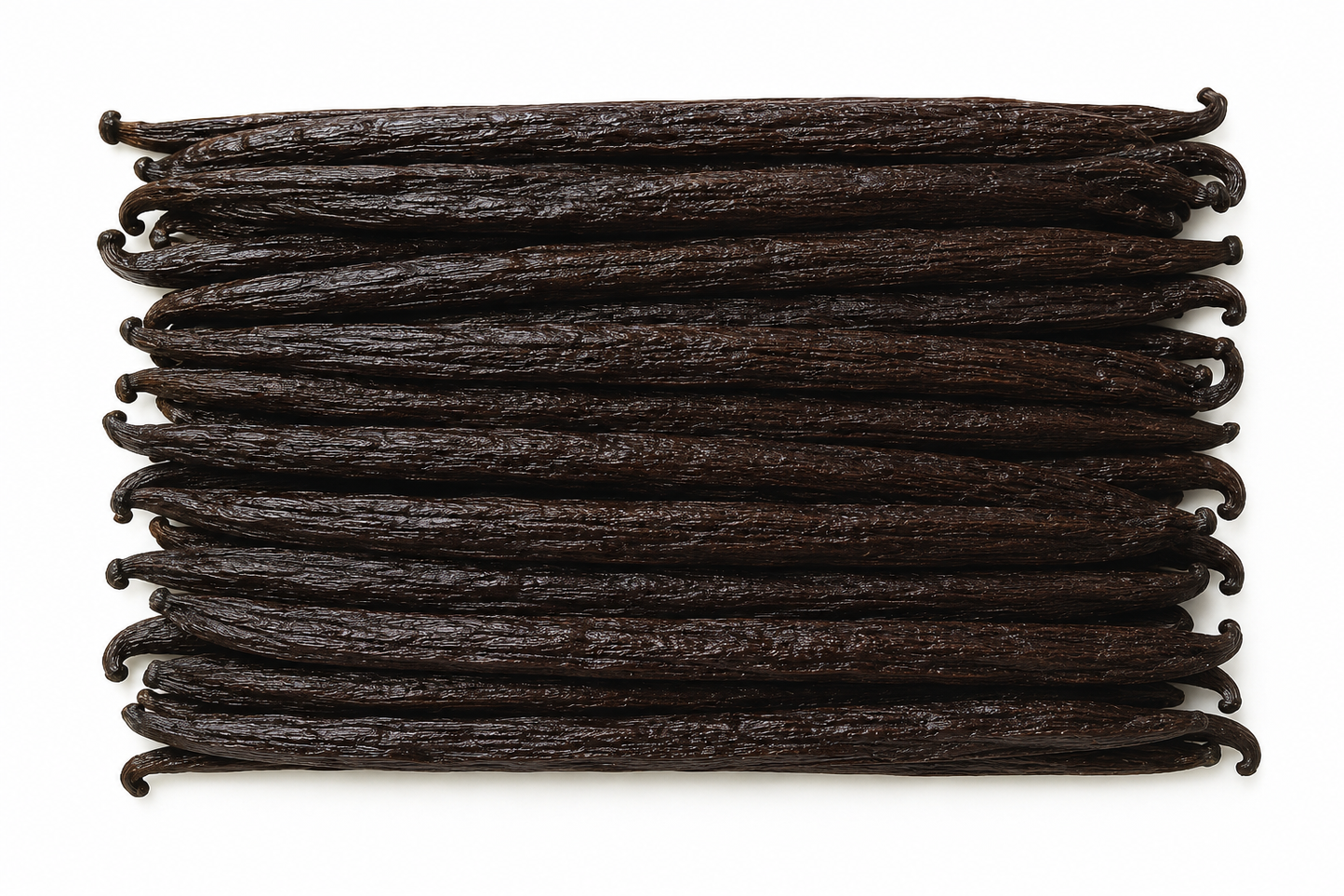 A stack of dark brown vanilla beans arranged horizontally on a plain white background.