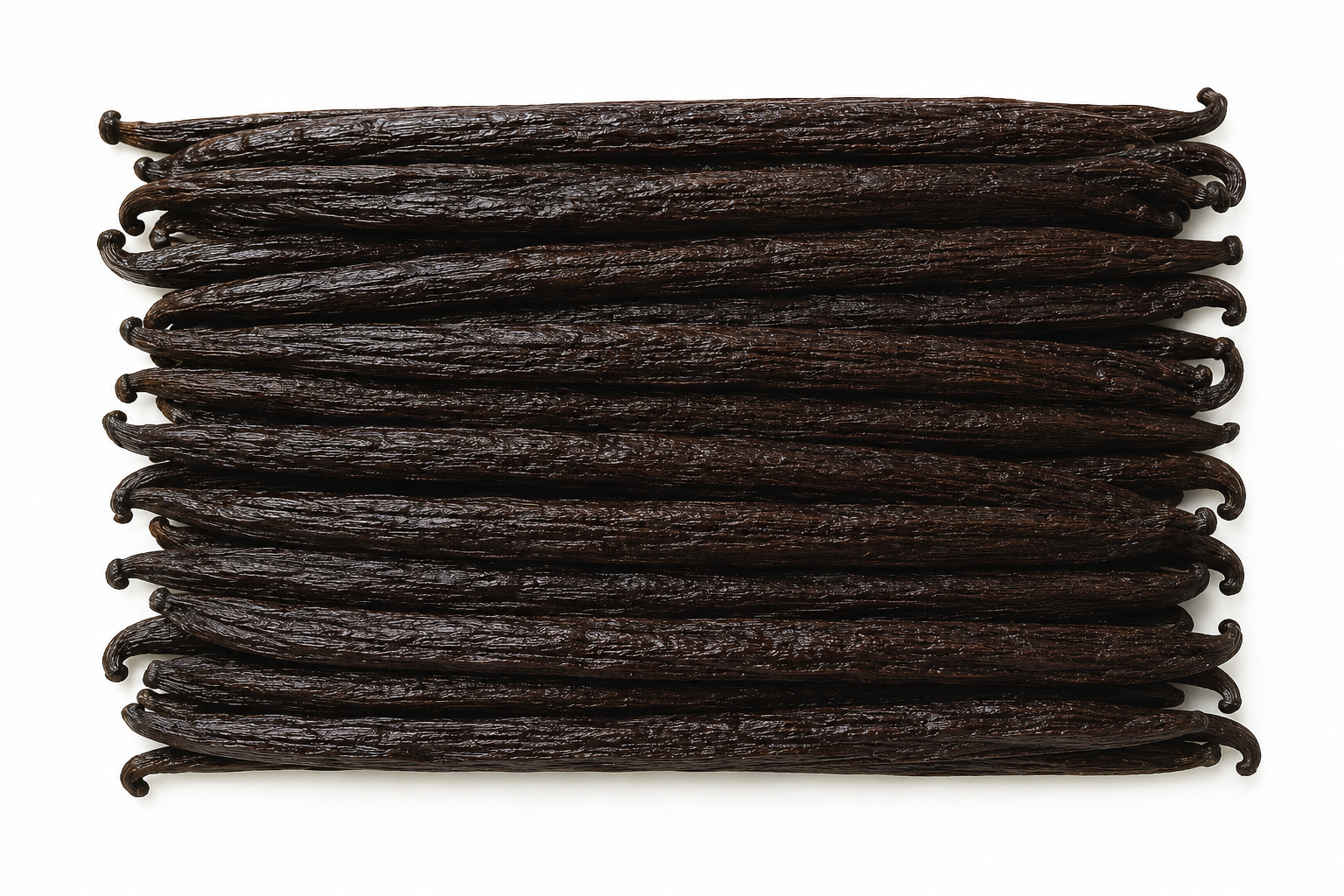 A stack of dark brown vanilla beans arranged horizontally on a plain white background.