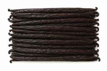 A stack of dark brown vanilla beans arranged horizontally on a plain white background.