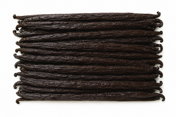 A stack of dark brown vanilla beans arranged horizontally on a plain white background.